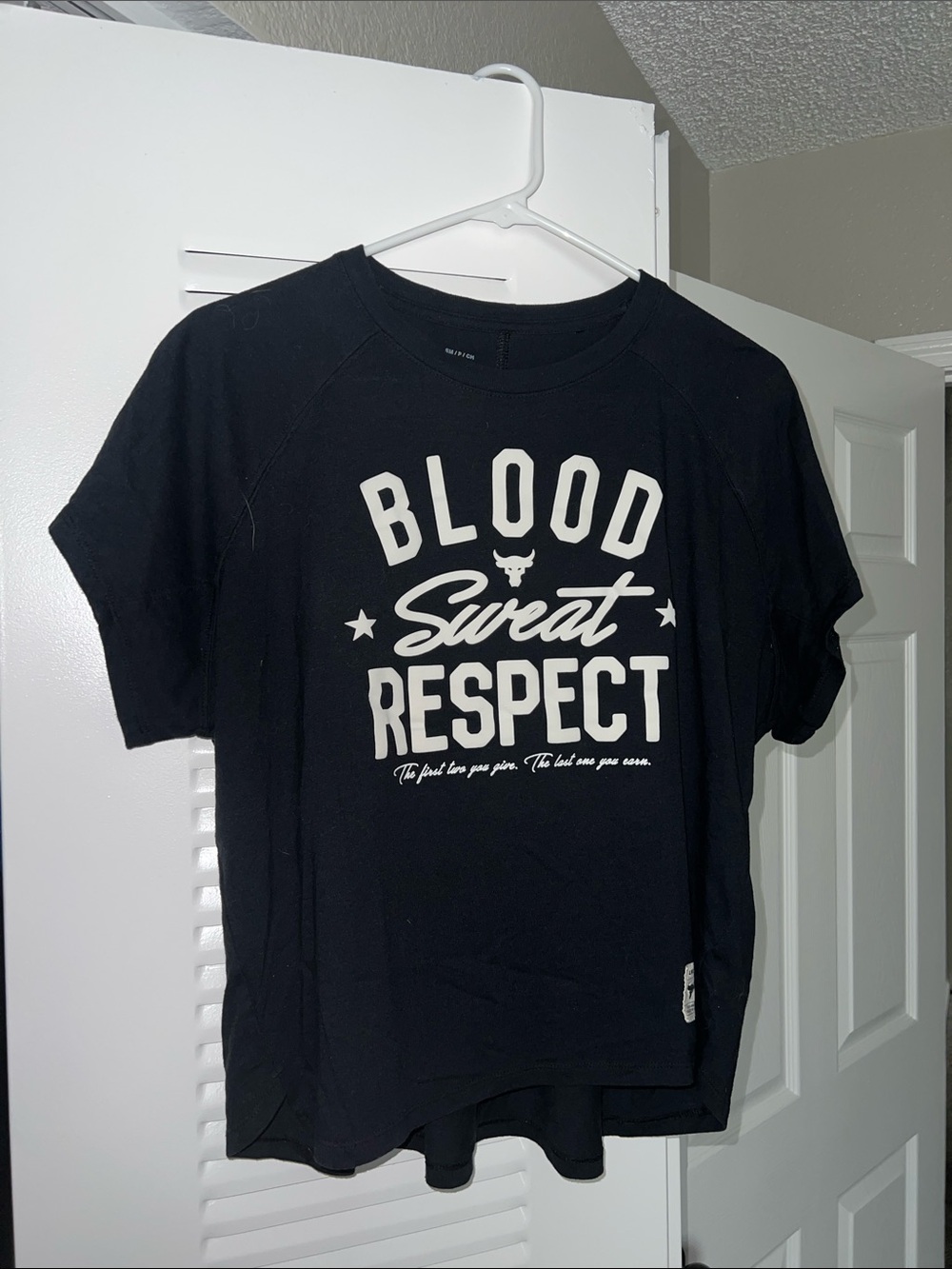 Project Rock | Black Crop Top with “Blood Sweat Respect" Graphic